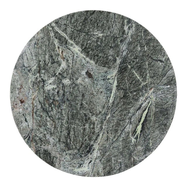 Green/brown round marble top side table with matte black iron base. Modern design with clean lines mixes beautifully with...