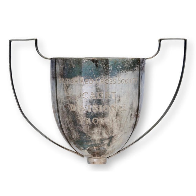 An early 20th century British Red Cross Society Cadet Divisional Trophy in silverplate. Engraved for the historic British...