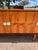 A striking Art Deco sideboard, circa 1940s, featuring beautifully figured light Macassar veneer, clean geometric lines,...