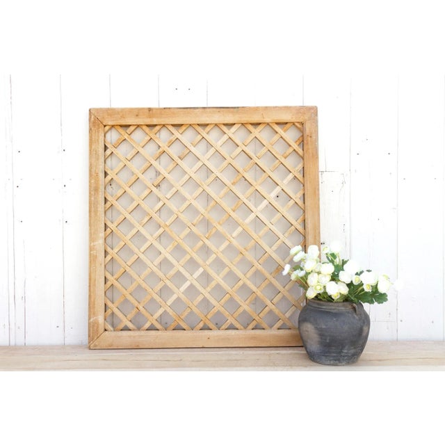 A traditional architectural feature of Chinese buildings, this beautiful antique Chinese lattice window was prominent in...