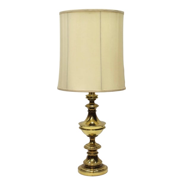 This lamp has a turned column design with multiple decorative sections, including a tiered base. 3-way knob on socket....