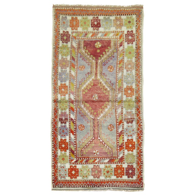 Mid 20th century tribal Turkish scatter size rug. Measures: 2'5'' x 4'8''.