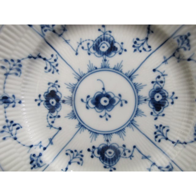 Vintage Royal Copenhagen, plain blue, fluted salad plate, 179. Measures 7 5/8" x 1" tall. In excellent condition, no...