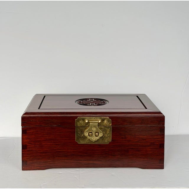 We are very pleased to offer this elegant Chinese hardwood box, circa 1950s. Beautifully crafted in rosewood, this piece...
