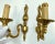 Pair of vintage French wall sconces, a testament to mid-century craftsmanship. Dating back to the 1960s, these sconces...