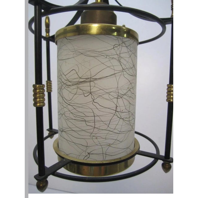 HERE WE HAVE: A vintage, mid-century modern/sort of Asian style hanging light fixture! Not marked with a maker's name that...