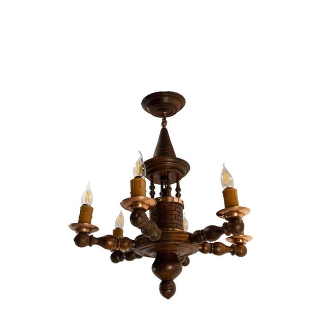 French rustic-style six-light beech and copper chandelier. Its design features a miniature well at the top of the fixture....