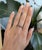 Five natural sapphires in mixed blue and purple hues total 1.51 carats across this solid 18K yellow gold estate ring....