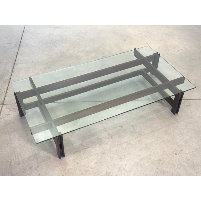 Coffee table with wooden frame and glass top, model 751, made by Cassina, 1960s. Publications: Catalog Figli di Amedeo...