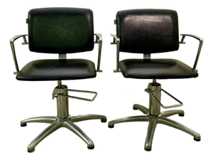 A Pair of Vintage Rem Hydraulic Salon Chairs