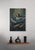 Calm in the Chaos by Terra Novak | Oil on wood Woman in blue with otters in a serene setting For Sale - Image 4 of 5