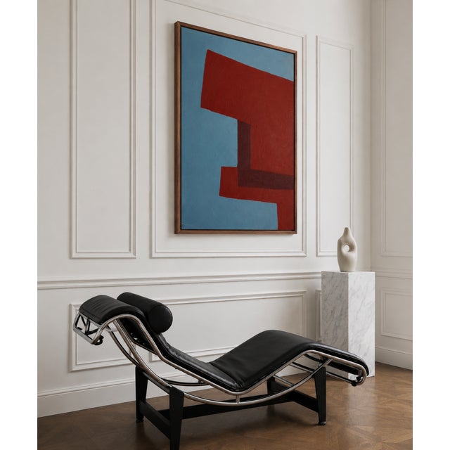"Structure in Red and Blue" explores the interplay between balance and contrast through a minimalist geometric...