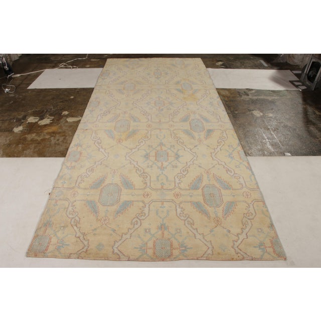 A 6x12 fragment runner hailing from an antique Agra rug, handmade in wool originating from India circa 1920-1930. Among...