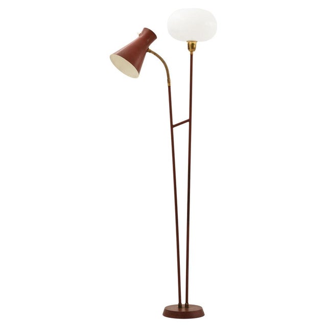 This rare floor lamp was produced by norrköpings lampfabrik in sweden during the 1950s and exemplifies mid-century...