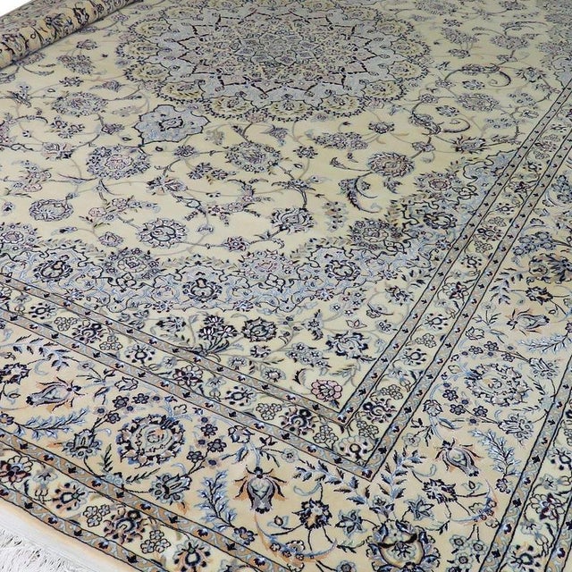 Hand-knotted Nain rug | Knot density: 6La 56 Raj (approx. 640.000 knots/m²) | Material: Wool & Silk | Size: 255 x 355 cm |...