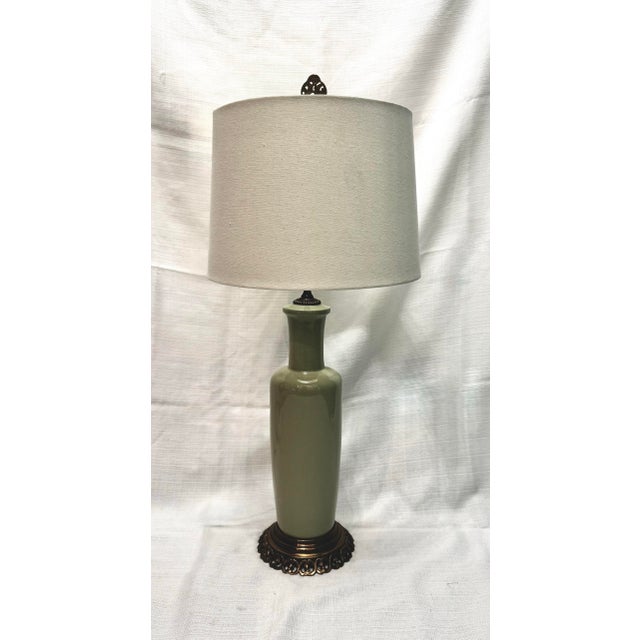 An exquisite mid-century modern vasiform table lamp attributed to the premier lighting house Paul Hanson Co. (New York)....