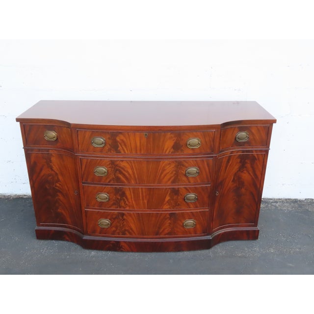 This magnificent Sideboard is made of wood, solid wood, mahogany, flame mahogany, and veneer. This high quality piece is...