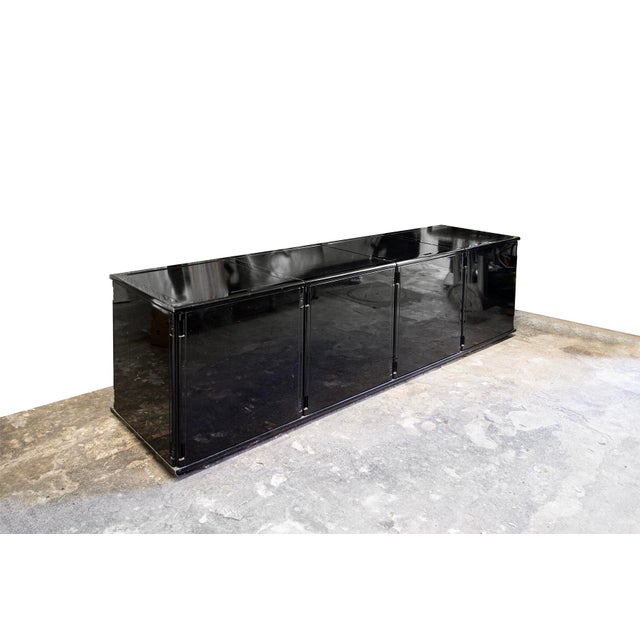 Sideboard - bar cabinet in black lacquered wood. Larco model Designer Gianfranco Frattini Manufacturer Molteni 1970s I...