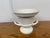 Design Plus Gallery presents a Trophy Urn or Pedestal Vase with Double Handles. Made from white ceramic, this multifaceted...