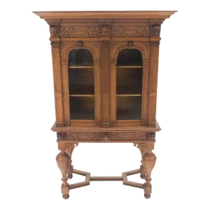 Heavily Carved Oak Faces Urns Motive Two Door China Cabinet c1880s