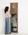 This mirror carries genuine presence, its distressed gold gilt, floral swag motif immediately setting the tone for the...