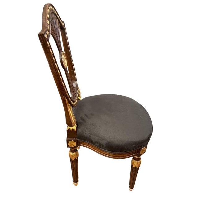 Elegant pair of early 19th century Russian Neoclassical side chairs, finely crafted in mahogany with parcel-gilt...