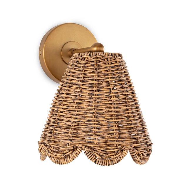 The Kismet Hanging Sconce is a perfect fixture for any room with a sweet, simple design and woven rattan-like shade. And...