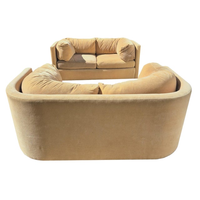 This is a remarkable pair of postmodern curved back love seats signed by John Masheroni for Swaim. The loveseats are...