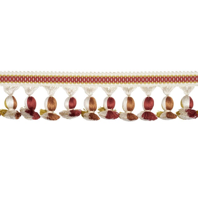 Ali Tassel is a stylish striped tape with multicolored onion fringe. Use this lustrous textural trim to imbue upholstered...