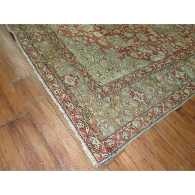 Finely woven Turkish Sivas carpet with Classic medallion and border, predominant color accents in gray and red. Measures:...