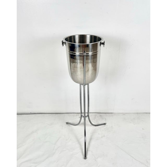 Mid century stainless steel champagne bucket with stand. Ice bucket with handles, with retro 3 legged stand. A classic...