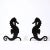 Paint Pair of 1930s Art Deco Andirons in Patinated Black Enamel With Mirrored Seahorse Sillouette Motif For Sale - Image 7 of 12