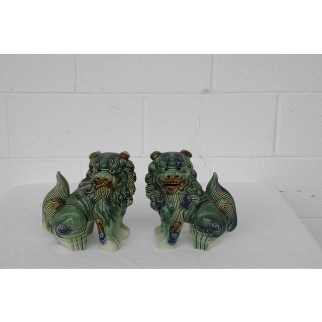 Chinese Foo Dogs sculptures are often placed in pairs at the entrances of temples, palaces, and homes to serve as powerful...