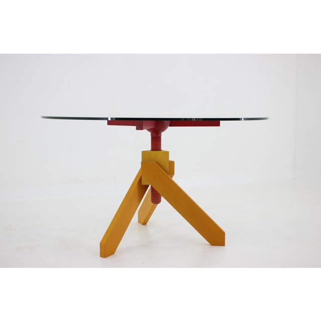 Exceptional design. Table and stools have adjustable height. Crack in the wood does not affect the stability and...