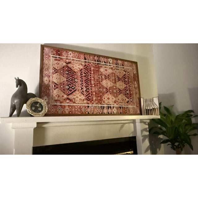 A striking large-scale framed textile wall hanging by Loloi, professionally presented as a substantial piece of decorative...