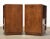 A pair of mid century modern walnut spear tip nightstands designed by T.H. Robsjohn Gibbings for Widdicomb with aluminum...