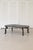 Gorgeous biomorphic Nero Portoro Marble coffee table with Venetian-style carved wooden base. This marble is only quarried...