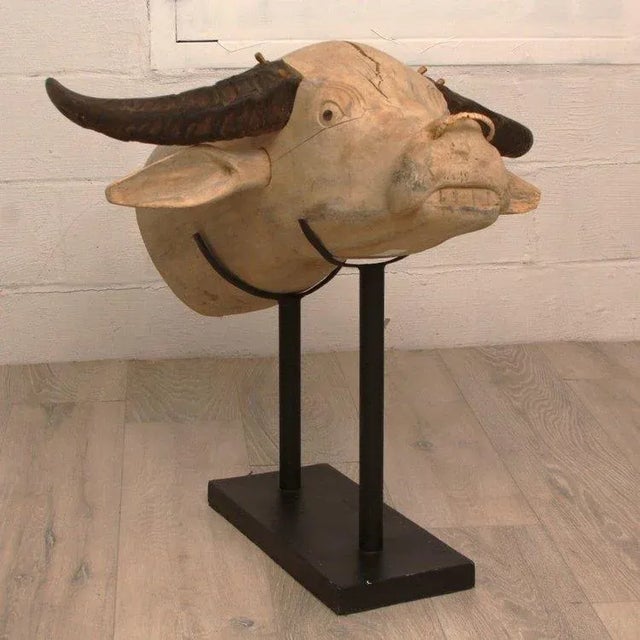 Introducing our Vintage Hand Carved Water Buffalo Head Sculpture, a true embodiment of artisanal craftsmanship and rustic...