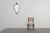 This elegant French mirror from the 1950s captures the enduring grace of the Louis XVI style. Its elongated shield‑shaped...