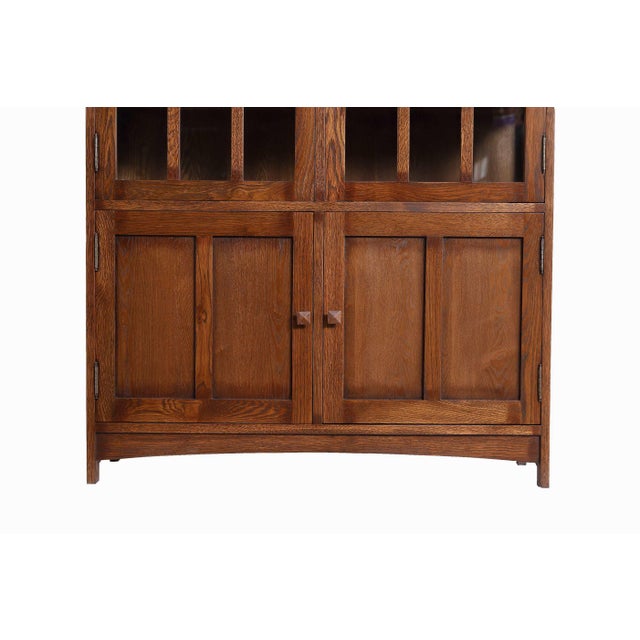Elevate Your Space with Timeless Elegance: Mission Oak 4 Door Display China Cabinet Bring the classic charm of the Arts...