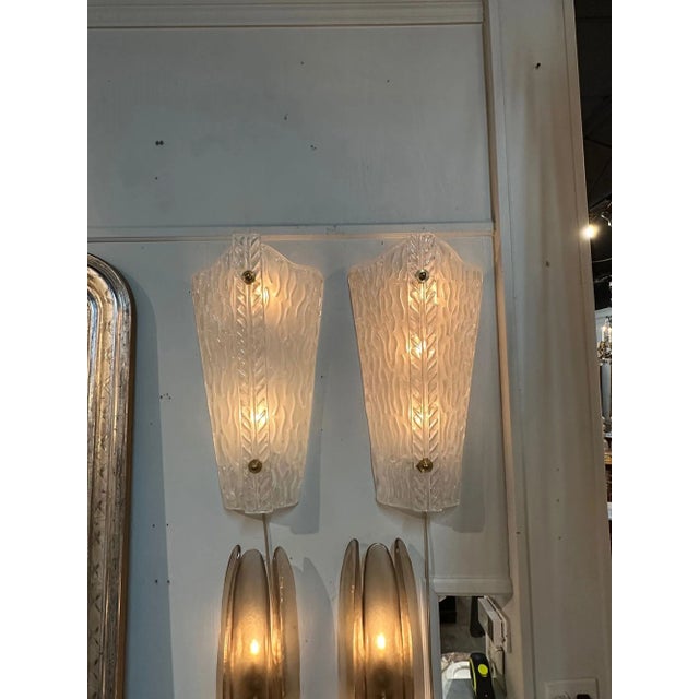 Very nice pair of frosted Murano glass sconces. Very upscale for an elegant touch!