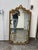 Design Plus Gallery presents a Vintage Louis XV Style Gilt Baroque Wall Mirror. This ornate mirror showcases an elaborate...