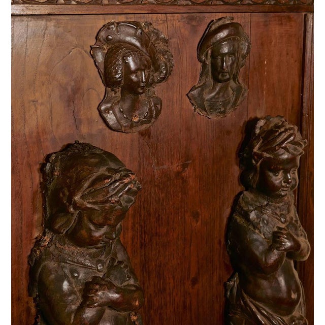 Leathermaché Putti, architectural decorations. These very rare pieces are made in Leathermaché, two of them are characters...