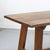 Vintage Brutalist dining table made of solid oak, crafted in the traditional manner. A robust and distinctive design with...