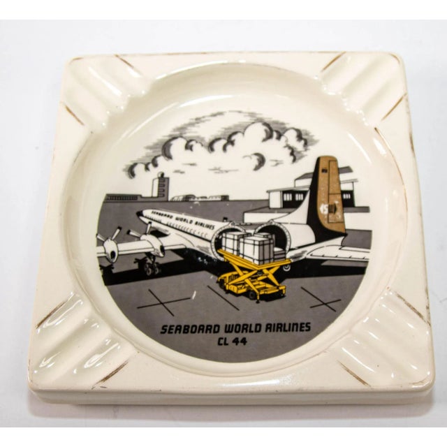 1960s " Seaboard World Airlines CL44" Advertising Ashtray By Salem Ceramic.The piece is in good vintage condition with no...