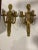 A pair of circa 1920’s gilt bronze neoclassic style sconces