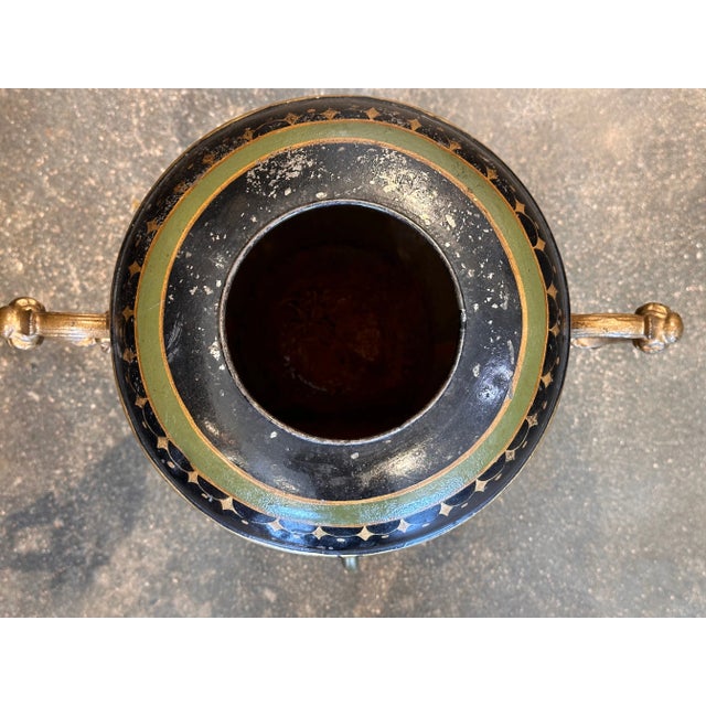 A nice tole water urn. They look great on a sideboard.