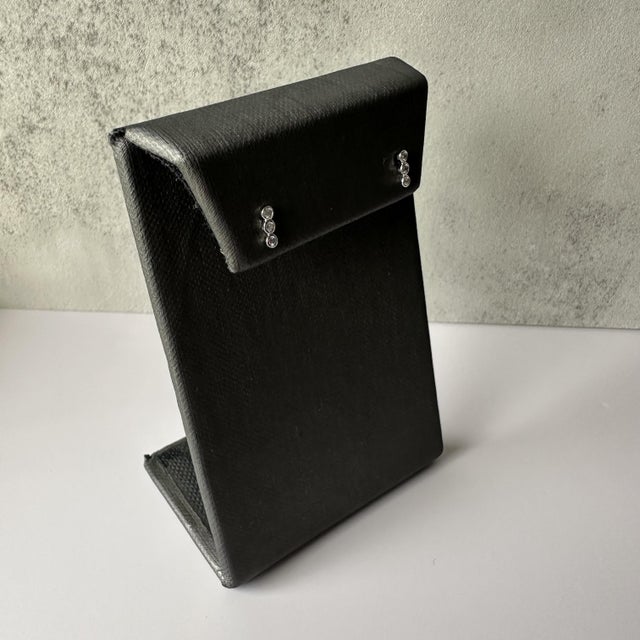 Delicate and timeless, these Petite Bezel Set Diamond Studs are the perfect everyday accessory, crafted in elegant 14kt...