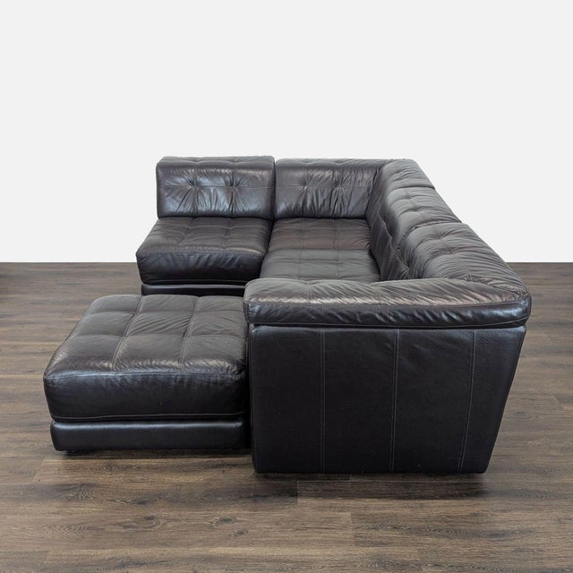 Comfortable and spacious Chateau d’Ax sectional in sleek brown leather. Features deep seating and plush cushioning for...