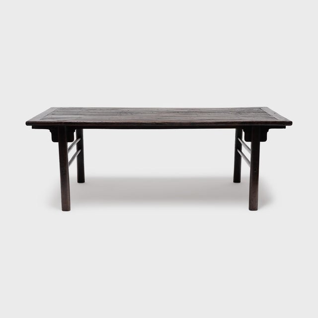 Known as a calligrapher's table, this expansive Chinese writing table once gave a Qing-dynasty (1644-1911) scholar-...